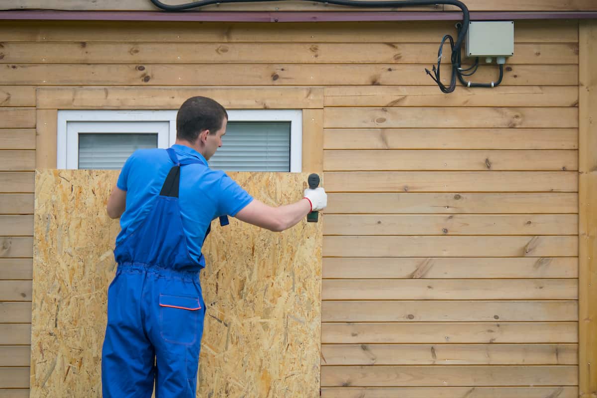 boarded up windows to prepare for a hurricane in an apartment