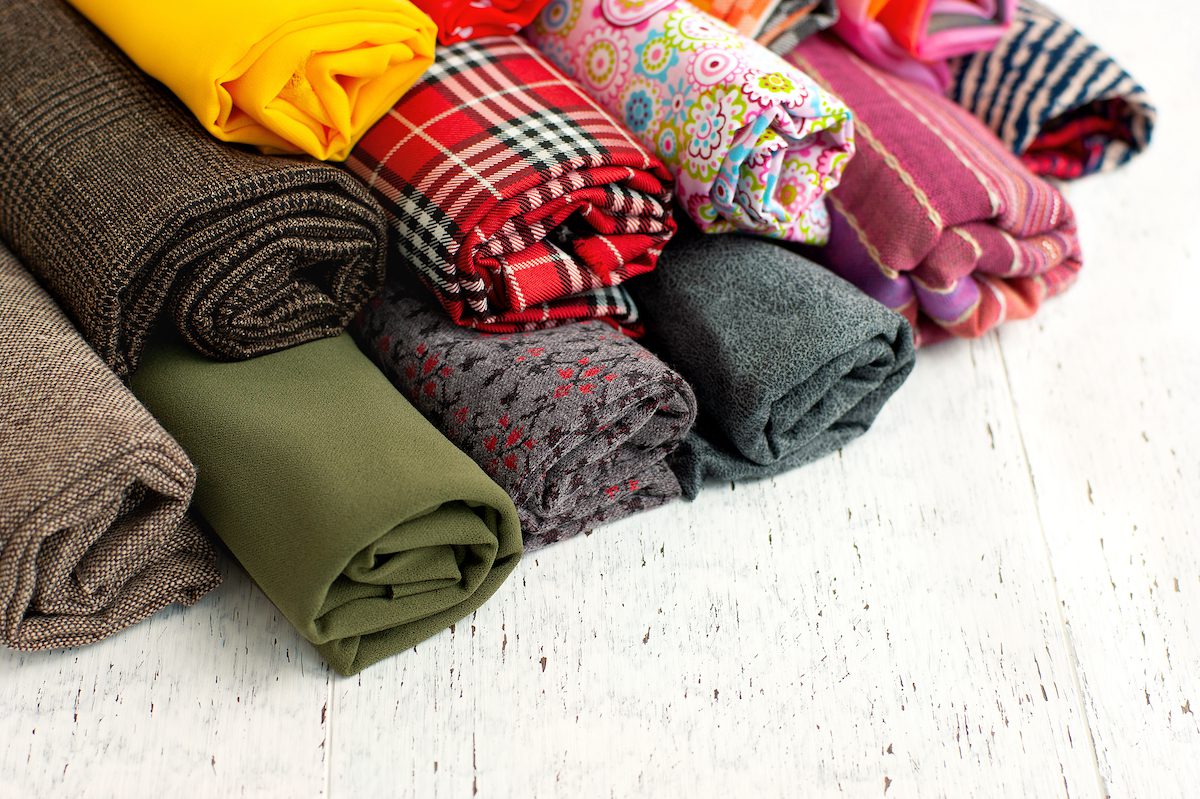 Roll up your clothes to make more room.