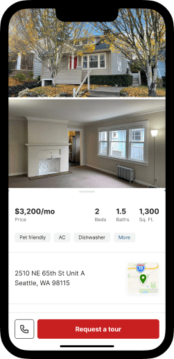 A phone displaying the Redfin app